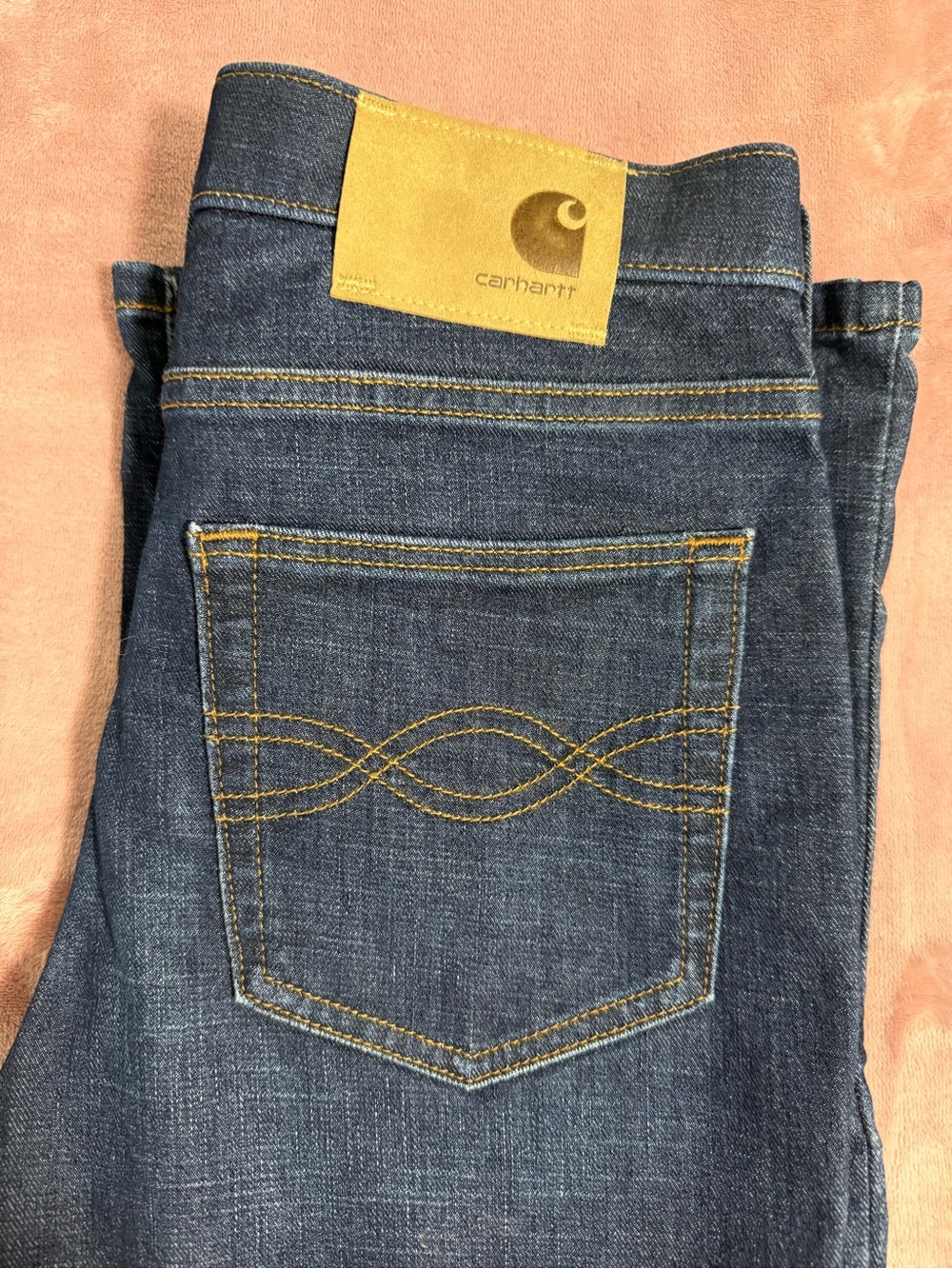 Carhartt Men’s Dark Blue Relaxed Fit Jeans with Tan Patch